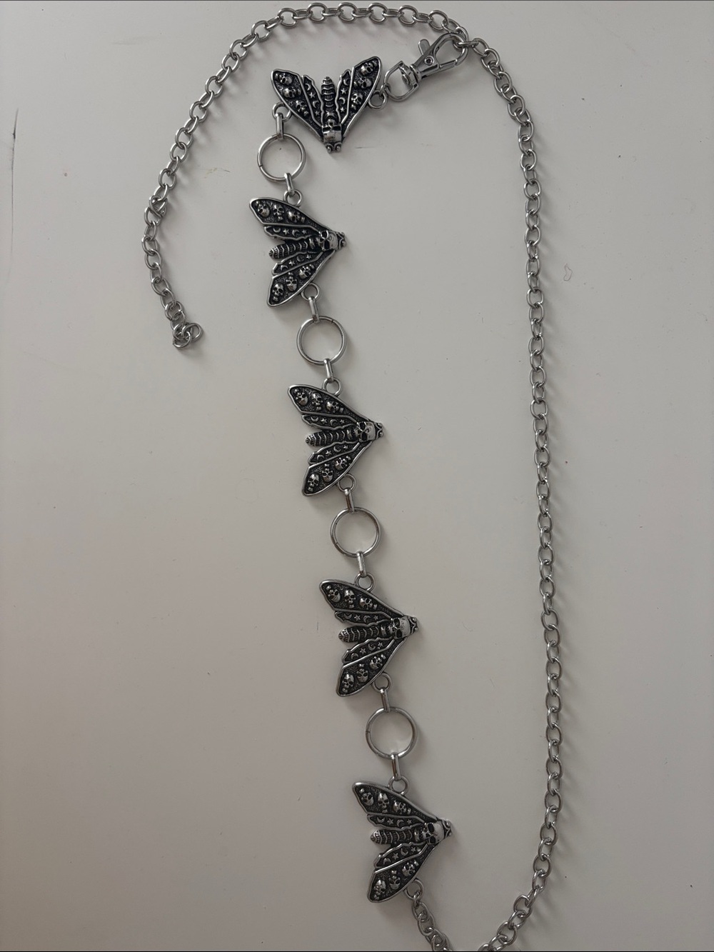 Moth adjustable metal belt